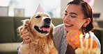Birthday, cake and happy woman with dog in home for celebration, surprise and party together. Animal, pet and person with Golden Retriever with dessert or treats for adoption, milestone and bonding