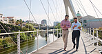 Tablet, walk and business men in city with company planning, collaboration and budget discussion. Teamwork, digital technology and financial managers with conversation, partnership and research