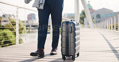 Business person, legs and walking with suitcase on bridge for commute, career travel or job opportunity. Employee, tourist or traveler with luggage or trip for new destination, immigration or journey