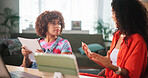 Women, documents or discussion with tablet for home business, budget expenses or costs. Female people, freelancers or remote workers with paperwork or technology for online startup or report at house