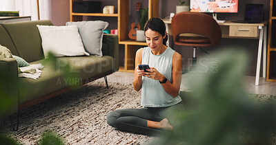 Buy stock photo Woman, smartphone and smile with exercise break in house, influencer and social media comment response. Mobile app, email or fitness blog with positive review, post communication or workout chat