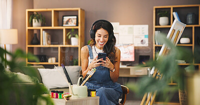Buy stock photo Home, painter and woman with smartphone, headphones and smile with social media. Mature person, apartment and artist with cellphone, listening to music and podcast for creative inspiration and audio