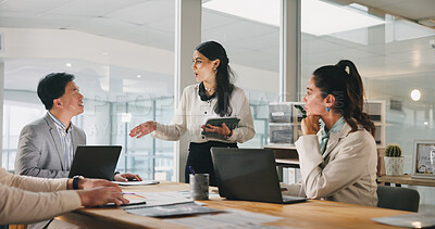 Buy stock photo Collaboration, feedback and meeting with business people in office for development or discussion. Laptop, update and tablet with corporate team in workplace for conversation, review or strategy