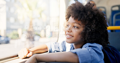 Buy stock photo Thinking, bus or travel with kid, smile or boy for commute with urban journey, scholarship and school trip. Academy, passenger or child by window with imagination, public transport or adventure ideas