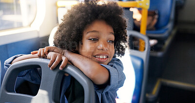 Buy stock photo Thinking, bus or travel with boy, kid and smile for commute with urban journey, scholarship and school trip. Academy, passenger or child in city with imagination, public transport or adventure ideas
