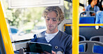 Commute, nurse and tablet with man on bus for schedule or travel to healthcare job. Agenda, public transportation, social media with serious medical professional in vehicle for journey to work