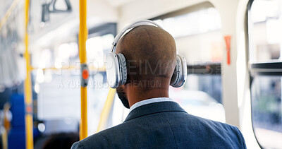 Buy stock photo Bus, travel and man with headphones, music and commuting to work in morning, listening or audio. Back, employee and person with tech for playlist, sound and passenger with radio for trip or streaming