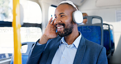 Buy stock photo Bus, travel and man with headphones, listening and commuting to work in morning, streaming or music. Trip, employee and person with smile for tech, journey or passenger with audio in public transport