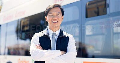 Buy stock photo Arms crossed, bus driver and portrait of Asian man at station for commute, public transportation or service. Journey, smile and uniform with happy coach conductor outdoor for metro tour or travel