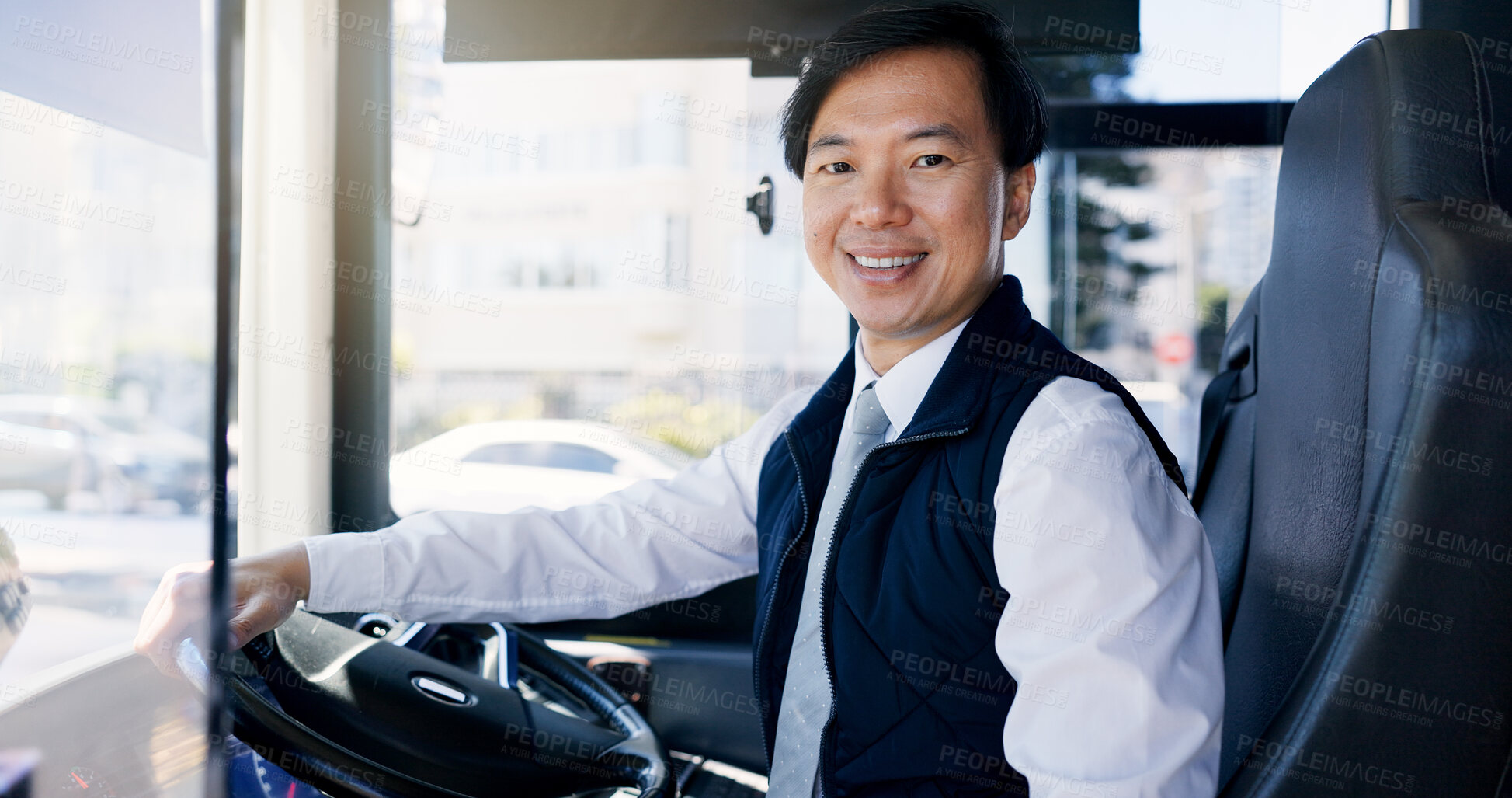 Buy stock photo Bus driver, portrait and smile of Asian man at station for commute, public transportation or service. City, driving and uniform with happy coach conductor in vehicle for journey, tour or travel
