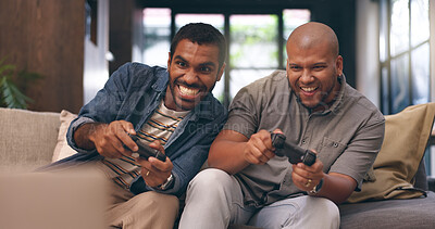 Buy stock photo Living room, friends and gaming with controller on sofa for multiplayer, competition and entertainment. Happy, people and men with smile in home for esports challenge, streaming and playful contest