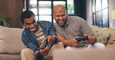 Buy stock photo Living room, men and gaming with controller on sofa for multiplayer, competition and entertainment. Happy, people and friends with smile in home for esports challenge, streaming and playful contest