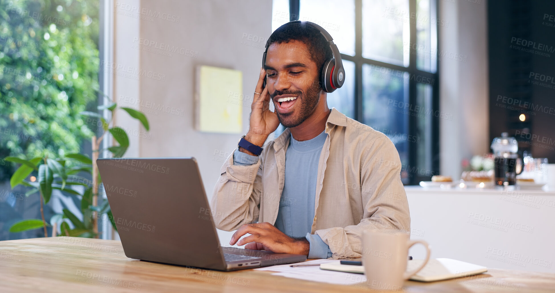 Buy stock photo Remote work, happy man and laptop in home with headphones, productivity or positive feedback for article. Creative writer, music or smile at tech with good mood, new opportunity or streaming playlist