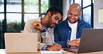 Business, men and writing notes with laptop for budget planning, financial report and information. People, documents and online for finance research, accounting tips and feedback for investment offer