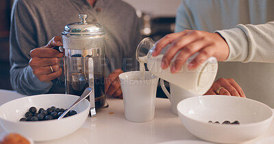 Buy stock photo Preparing, coffee and hands with milk, healthy food and cereal with protein in house and wellness. Home, nutrition and people with meal in morning, breakfast and ingredients for recipe in apartment