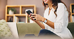 Home, hands and woman on sofa, smartphone and texting message with social media, connection and chatting. Mobile user, closeup or mature person on couch, cellphone or network with funny meme or humor