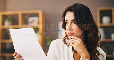 Buy stock photo Thinking, documents and remote worker with woman in home office for research, planning or reading. Freelancer, paperwork review and copywriting with person in living room for entrepreneur feedback