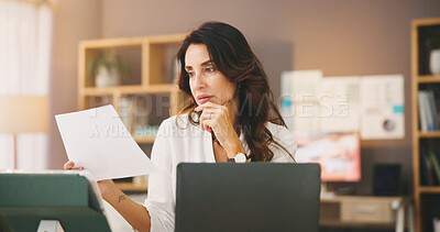 Buy stock photo Documents, laptop and thinking with woman in home office for research, reflection and reading. Freelancer, paperwork review and copywriting with person in living room for entrepreneur and feedback