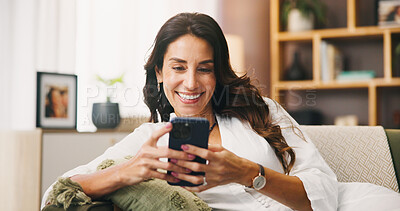 Buy stock photo Message, phone or happy woman in home laughing at comedy or chat on social media app for humor. Relax, texting or female person with smile, notification or funny meme joke for mobile entertainment 