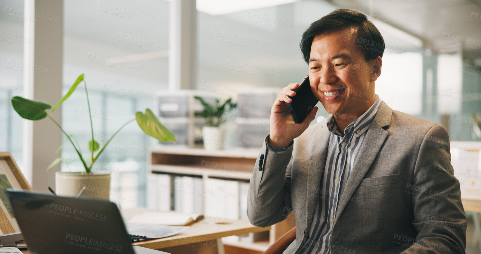 Buy stock photo Business, phone call and Asian man in workplace, smile and communication with financial consulting. Feedback, employee and accountant in office, cellphone or conversation with schedule for tax review