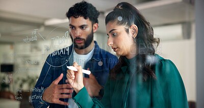 Buy stock photo Woman, writing and planning by glass for team project strategy, profit margin or budget for marketing. People, collaboration and mindmap with information, our vision and research for sales projection