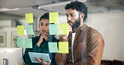 Buy stock photo Team, thinking and planning with tablet by glass board for project strategy, ideas and sticky note for agenda. People, brainstorming and storyboard with online info, partner and research for solution