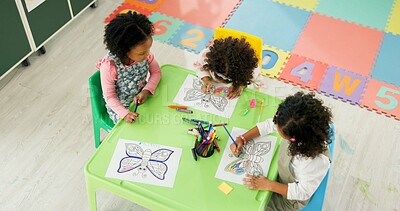 Buy stock photo Above, education and drawing with friends in classroom for child development, artwork and creative project. Youth, academy and growth with students at school for knowledge, learning and kindergarten