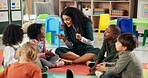 Singing, education and teacher with children in classroom for learning, nursery rhyme and creative. Growth, kindergarten and academy with woman and kids at school for helping and child development