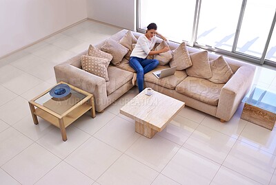 Buy stock photo Home, relax and woman on sofa with laptop for remote work, internet search or website subscription. Computer, online streaming and freelance girl on luxury couch checking social media with high angle