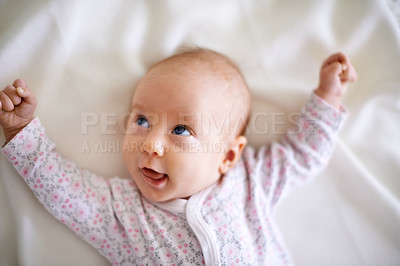 Buy stock photo Above, happy and baby on bed for rest, relaxing and calm for nap with blanket in nursery. Family, morning and face of newborn in bedroom for child development, comfortable and wellness in home