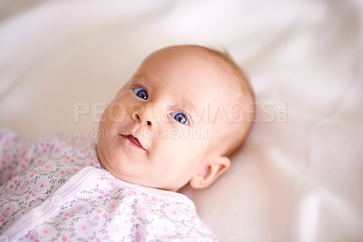 Buy stock photo Pajamas, happy and portrait of baby in bedroom for rest, relax and calm with infant in nursery. Family, morning and face of newborn on bed for child development, comfortable and wellness in home