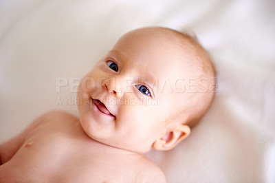 Buy stock photo Baby, newborn and happy on bed with excited face for listening, hearing and audio at home. infant or little girl waking up with smile and curious expression for vision, discovery and wonderment 