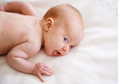 Buy stock photo Baby, bed and infant resting in house, newborn and comfortable lying in bedroom for care. Bare chest, calm and tummy time or healthy skin benefits, peaceful and duvet for childcare in apartment