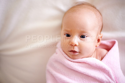 Buy stock photo Relax, wrap and portrait of baby with blanket for comfortable, peace and childhood development. Cute, infant and top view with face on bed in nursery for healthy growth,  rest and adorable at home