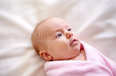 Buy stock photo Calm, baby and relax with wrap of blanket for comfortable, peace and childhood development in nursery. Adorable, infant and top view on sheet of bed for healthy growth, cute and resting at home
