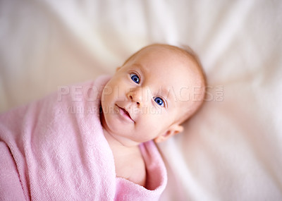 Buy stock photo Baby, portrait and towel on bed in home for bathing, hygiene or morning routine for healthy development. Infant, child or top view in nursery with washing for skincare, body care or wellness in house