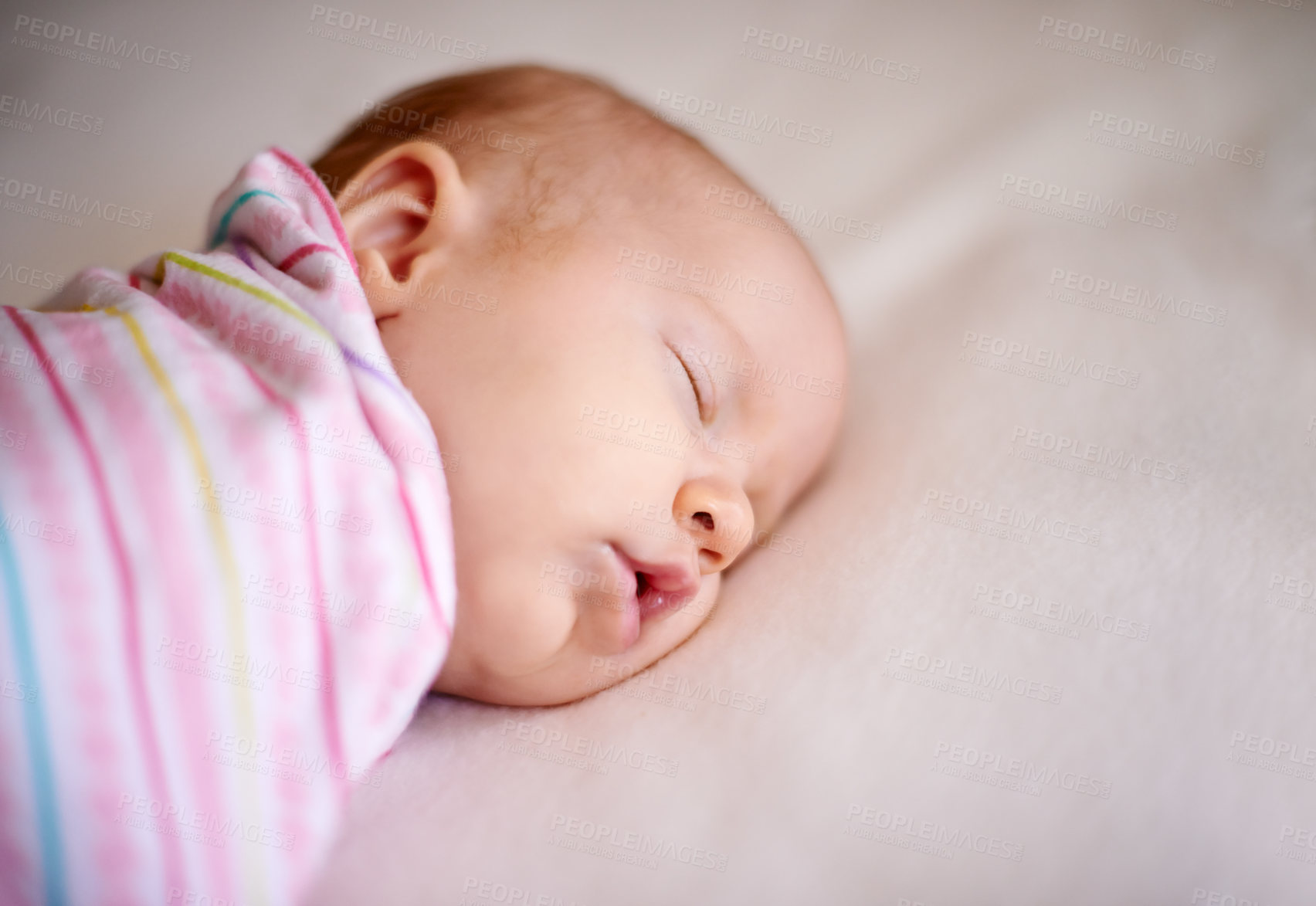 Buy stock photo Home, sleeping and baby on bed for rest, relaxing and calm for nap with blanket in nursery. Family, morning and face of newborn in bedroom for child development, comfortable and wellness in home