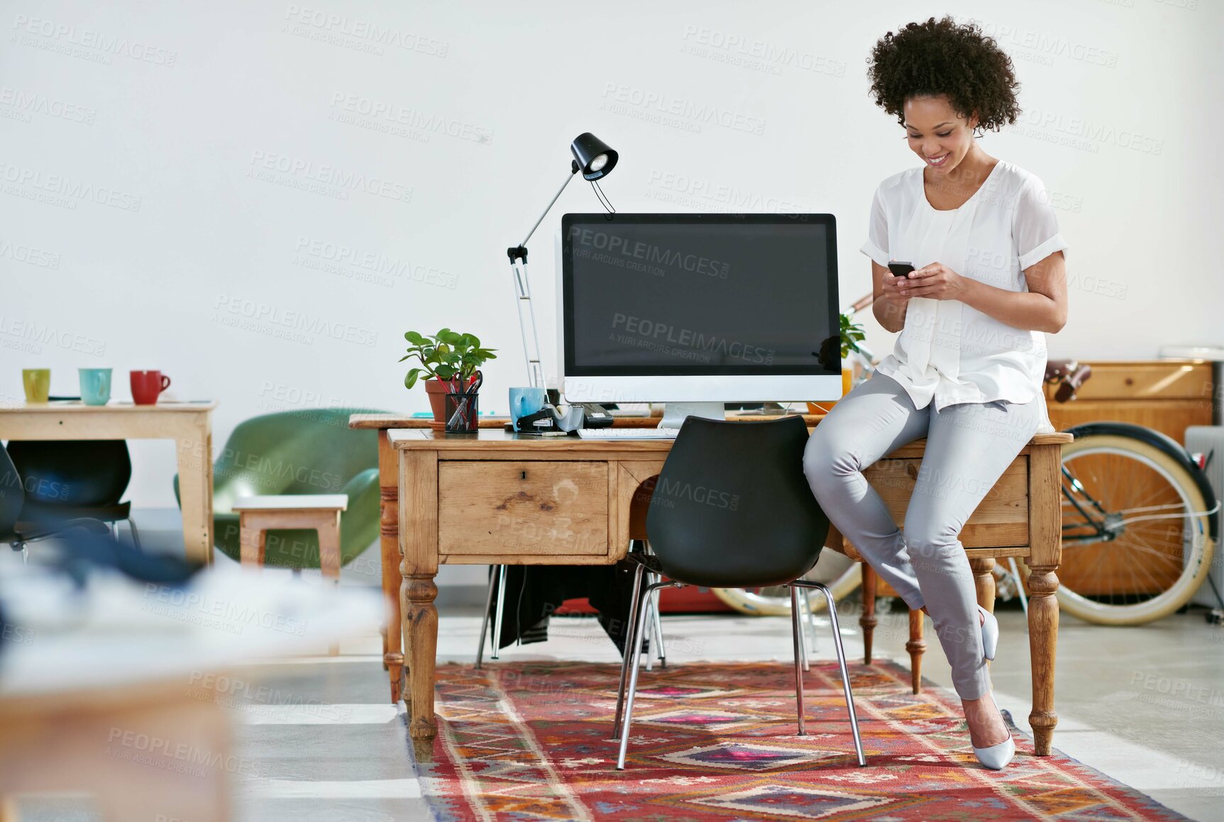 Buy stock photo Woman, office and happy on portrait with smartphone for research, online trends and ideas for magazine. Employee, female person and smile or pride for creative business, growth and social media