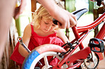 Learning how to care for her bike