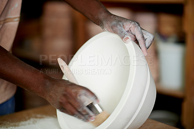 Buy stock photo Hands, pottery and bowl with paintbrush in workshop, handcraft and design for creative small business. Art, production process and person with painting handmade clay artwork for ceramic startup