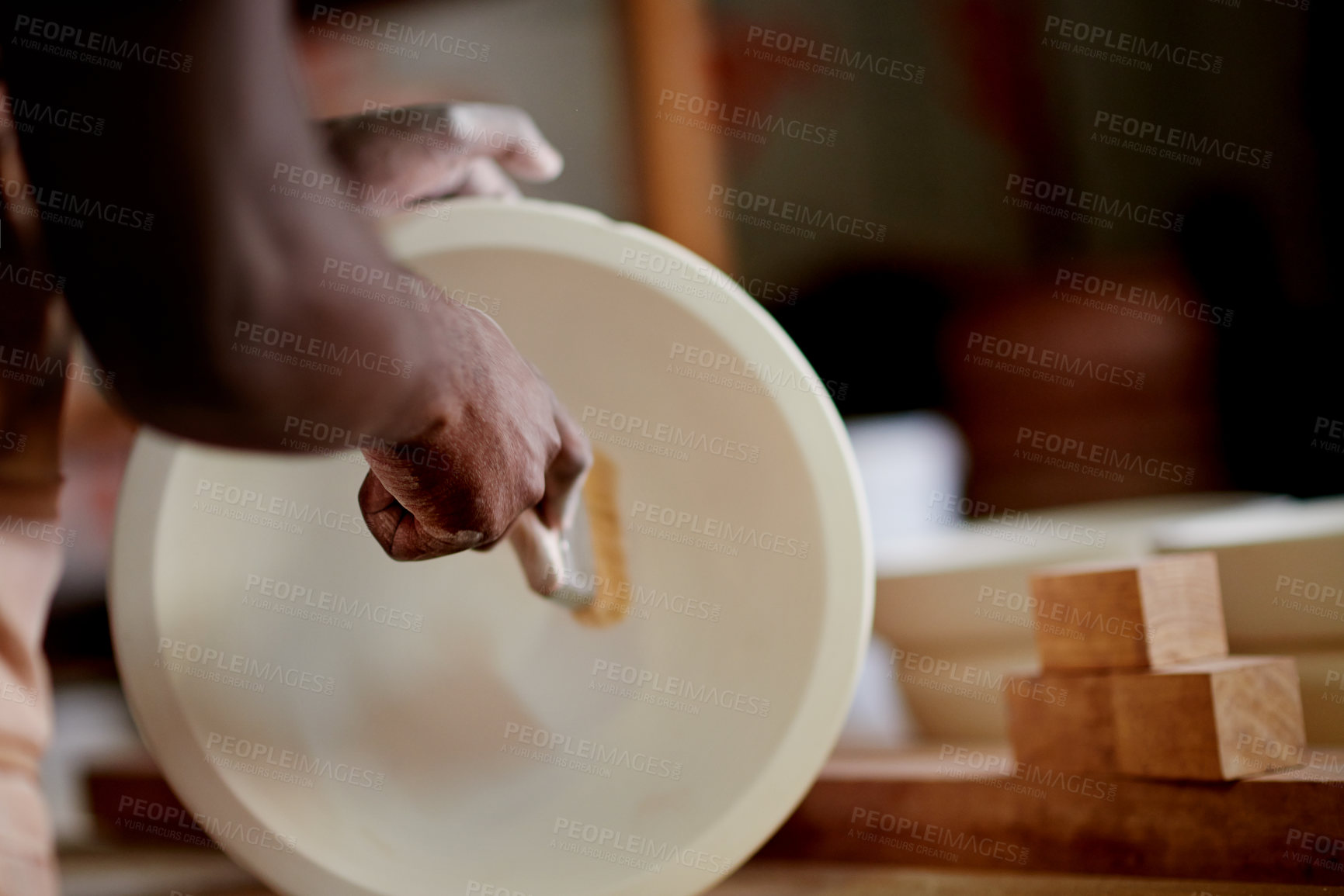 Buy stock photo Paint brush, pottery and hands of person in workshop with creativity, art or craft process. Design, hobby and ceramist with clay piece for ceramic sculpture with pattern, production or small business