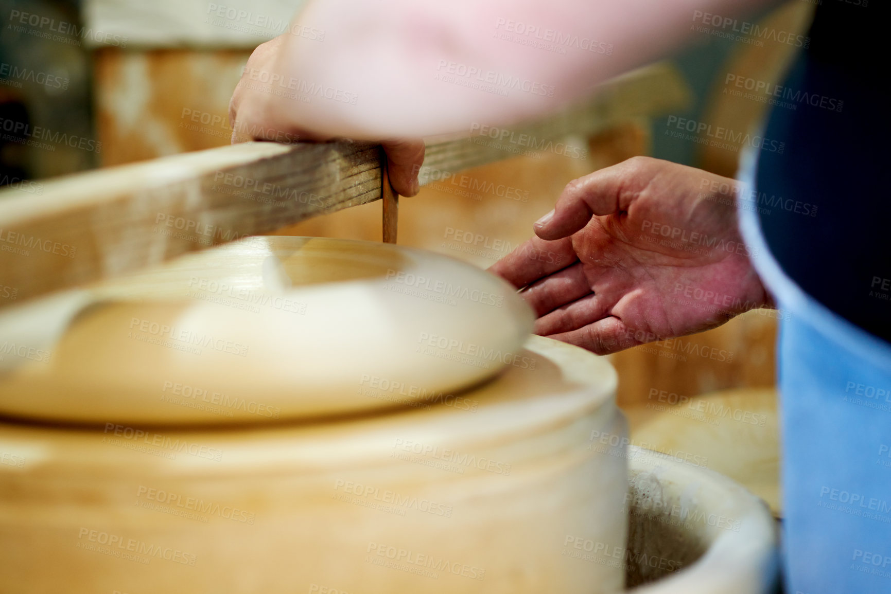 Buy stock photo Person, hands and pottery startup with clay as artist for manufacturing and creative pieces. Closeup, designer and entrepreneur with wooden tools or equipment for skill, small business or handicraft