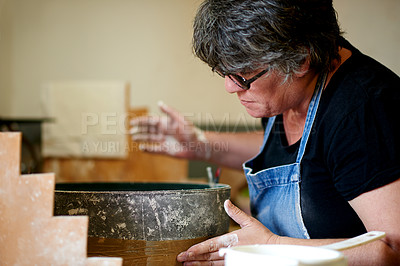 Buy stock photo Pottery, clay and woman in ceramic workshop, small business and creative process. Mature person, entrepreneur or artist in studio, product manufacturing and texture with sculptor or expert with mold
