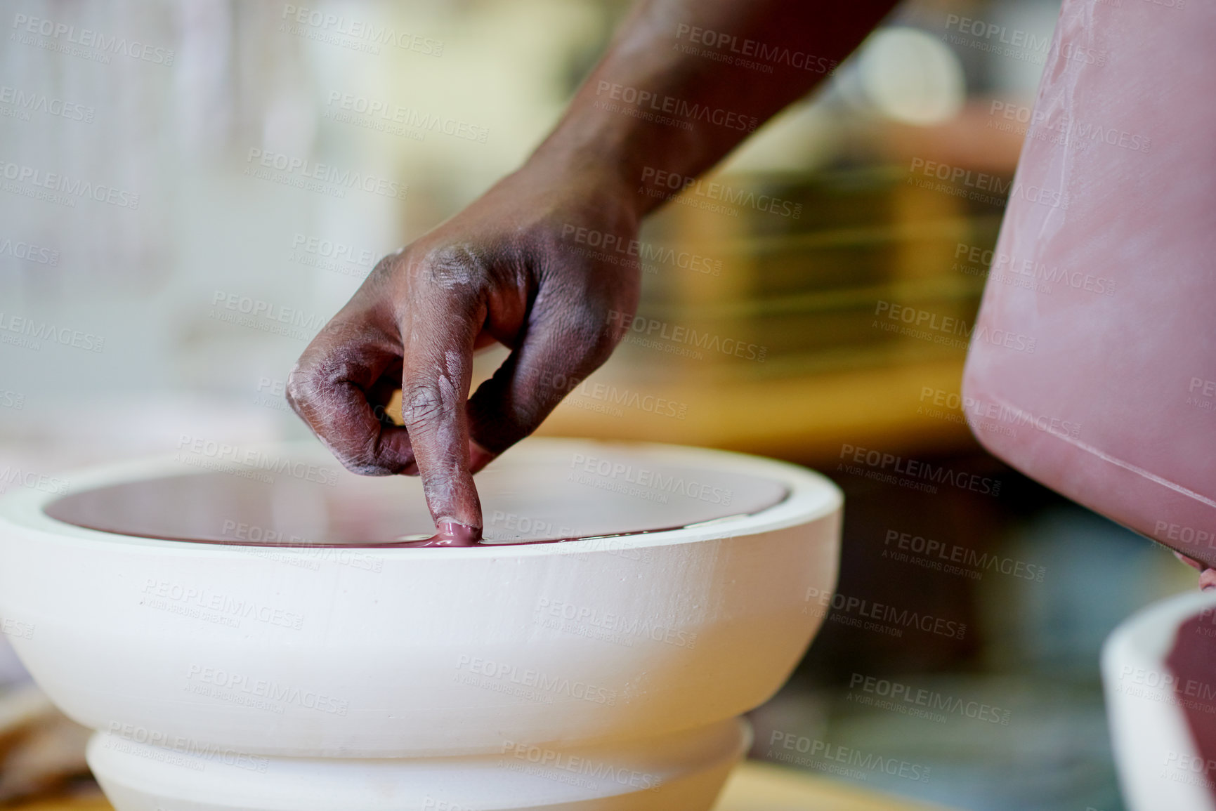 Buy stock photo Pottery, hand and person in startup with paint, creativity and fine detail on sculpture. Potter, creative manufacturing and skill in studio with clay creation, ceramic and product in small business