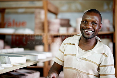 Buy stock photo Portrait, potter and man with smile, creative and confident for ceramic workshop, art and entrepreneur. Small business, artisan and person with skills for sculpture, talent and production in Kenya