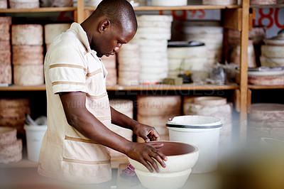 Buy stock photo Black man, pottery and bowl in workshop for ceramics, handcraft or artistic skills for small business. Entrepreneur, artist or male potter with creativity, handmade manufacturing or production