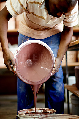 Buy stock photo Paint, pottery and man pour liquid in workshop or studio for ceramics, stain and creative hobby. Artisan, crafting and process with artist person for small business product, clay and bowl design