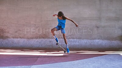 Buy stock photo Skateboard, city and girl with trick in air for jump stunt, practice and energy in New York. Woman, skater and female person with ollie flip on concrete for outdoor talent, skill competition or hobby