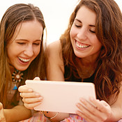 That meme's got them cracking up | Buy Stock Photo on PeopleImages ...
