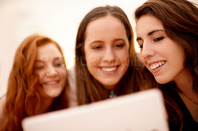 Buy stock photo Online, students and smile with friends and tablet for college application status, education app or elearning portal. Study group, digital report or university update with women on campus for results